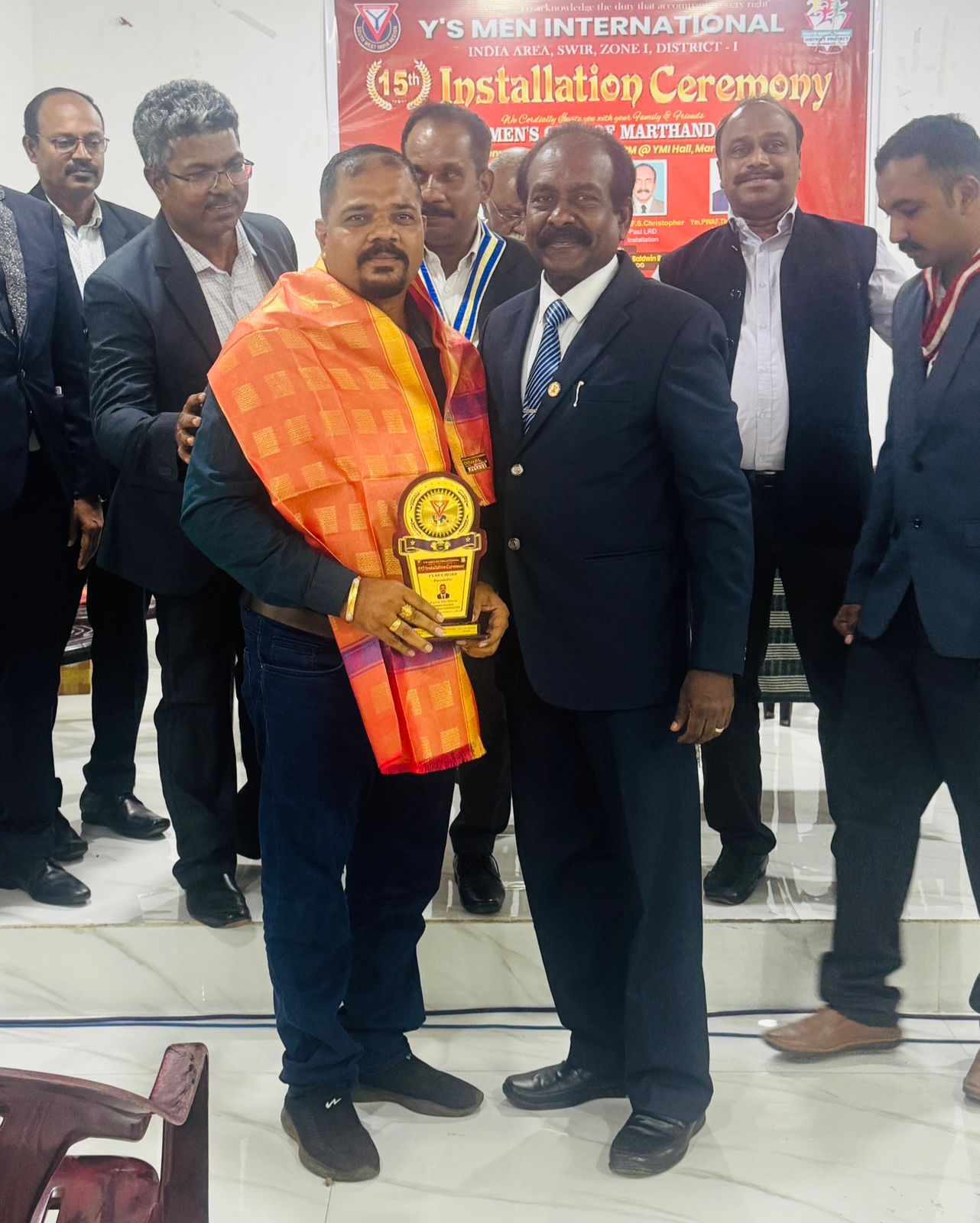 Honoring Dedication: Receiving the Award for Community Service